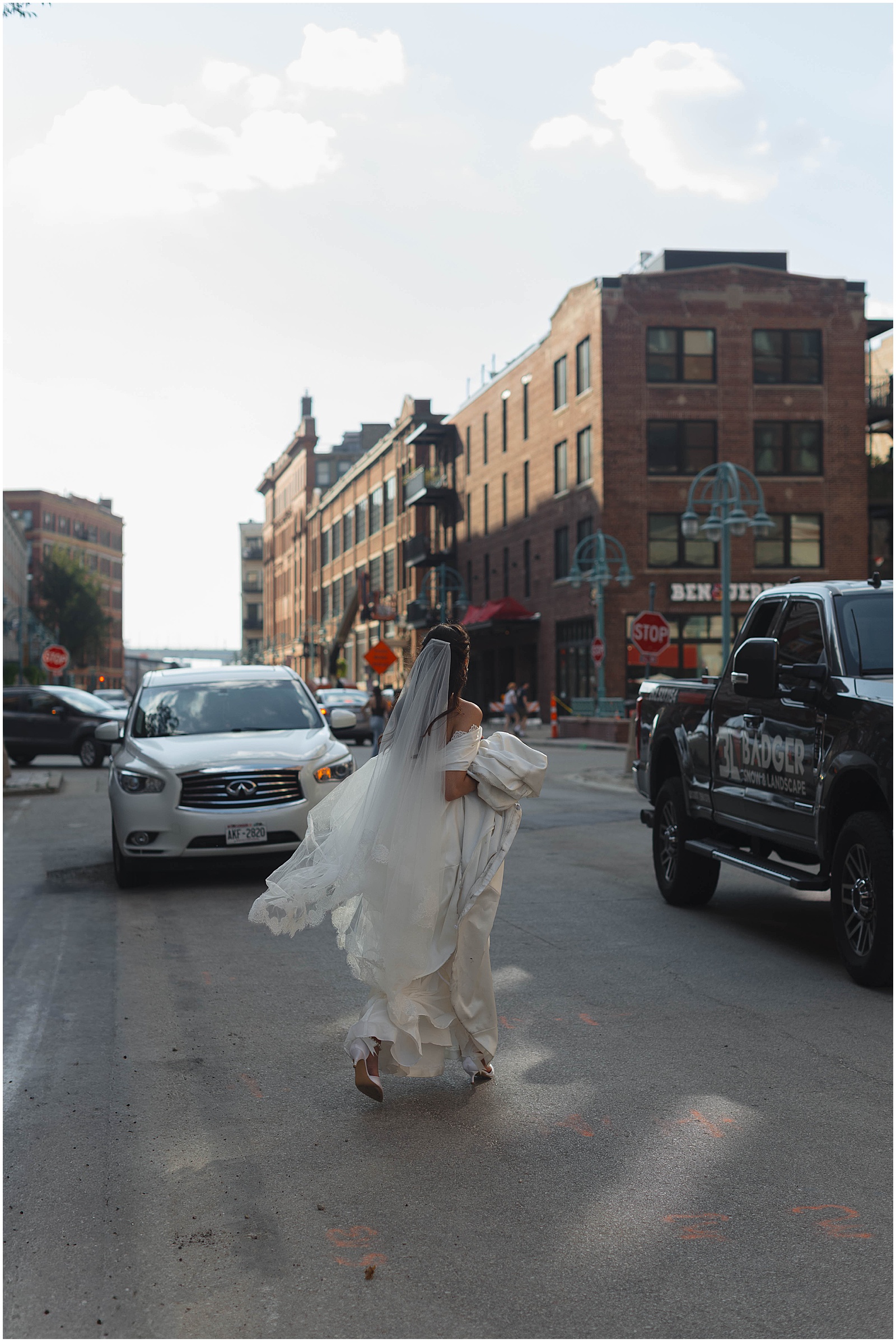 Bride walking through downtown Milwaukee
