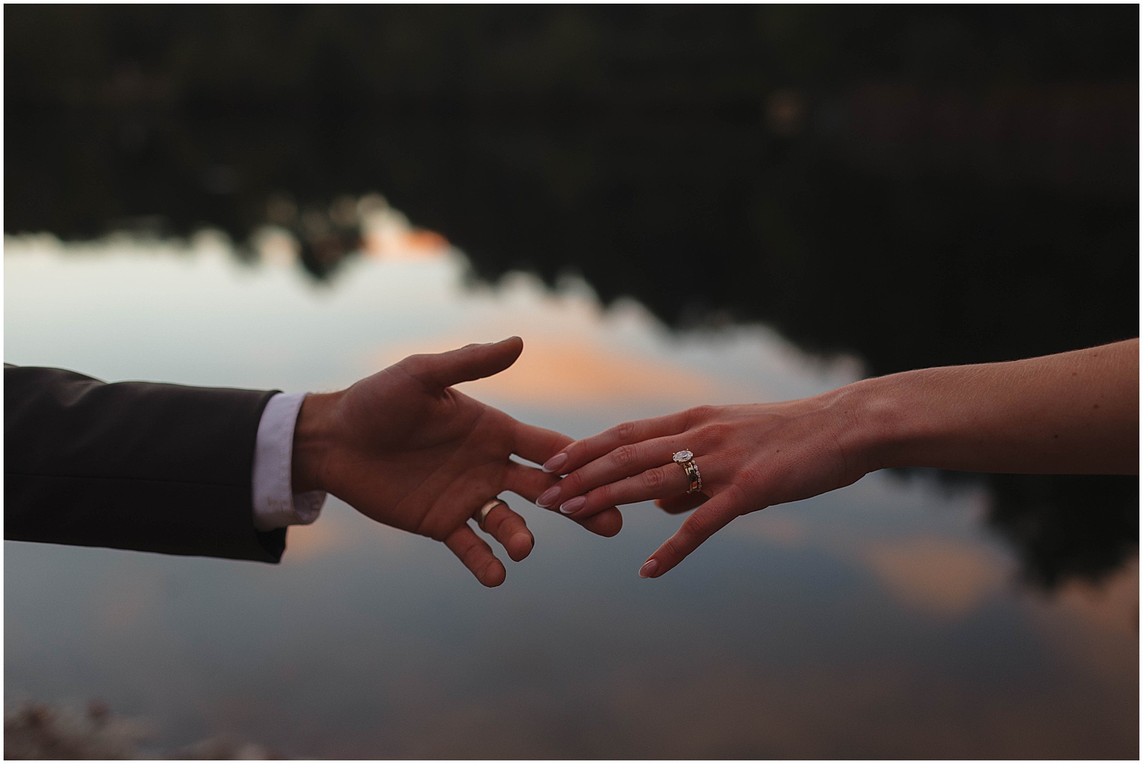 Bride and groom holding hands at their Wisconsin campground wedding